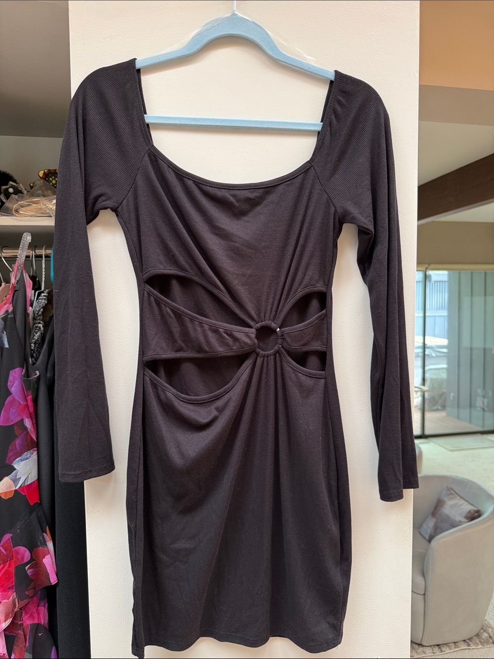 Sleek Black Long-Sleeve Cutout Ring Mini Dress